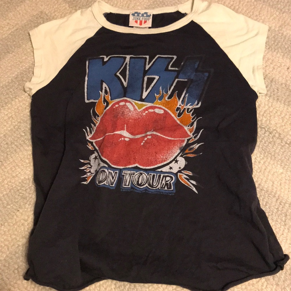 This is a white and navy Kiss tour shirt.